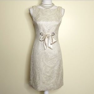 Shimmer cream sleeveless shift dress with bow